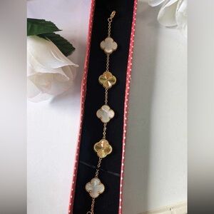 Elegant Gold and White Bracelet